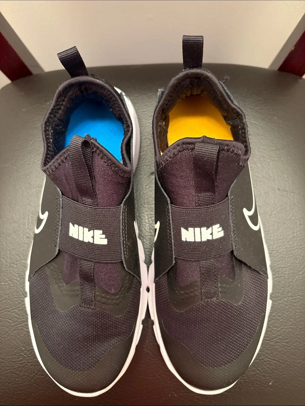 Nike Kids Black and Pink Slip-On Sneakers with White Swoosh